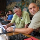 Russell Brice (expedition leader) and guide Mark Whetu discuss logistics over breakfast 
